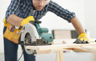 Carpenter Working With Circular Saw