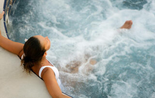 Attractive Woman Relaxing In A Whirlpool Hot Tub