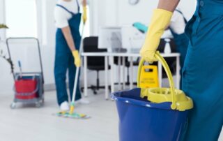 64167581 Close Up Of A Man Holding A Mop Bucket